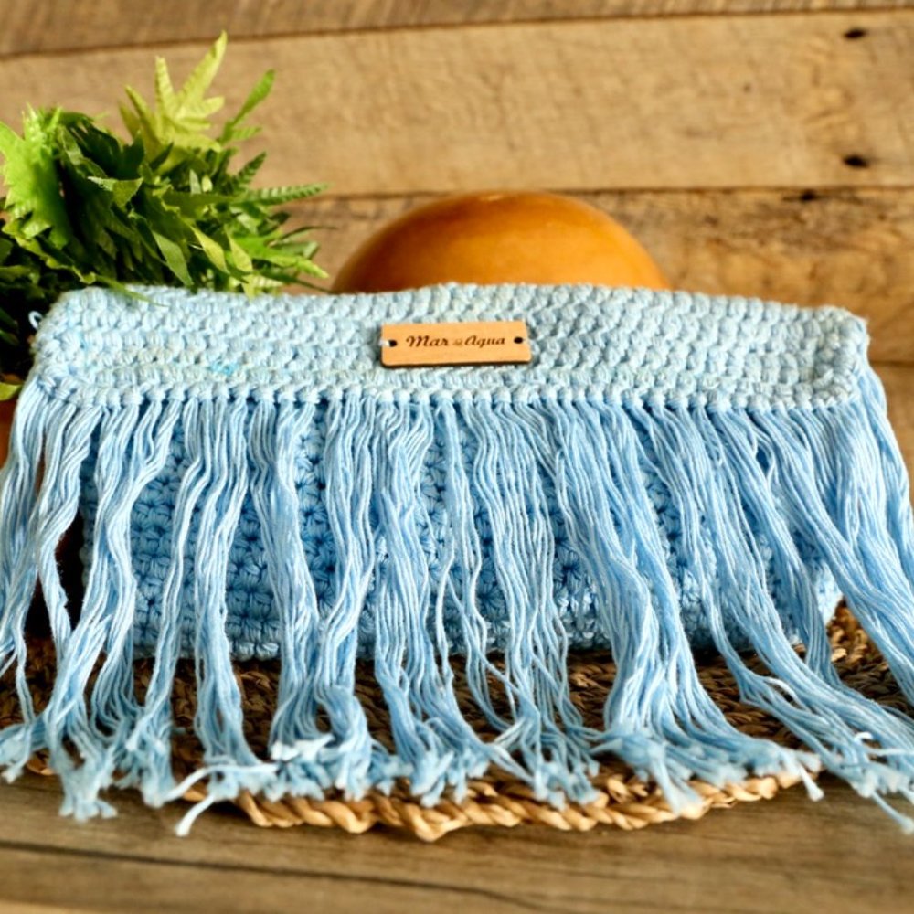 Blue woven clutch